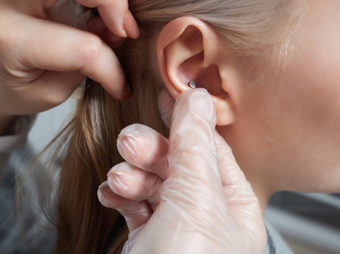 piercing an ear